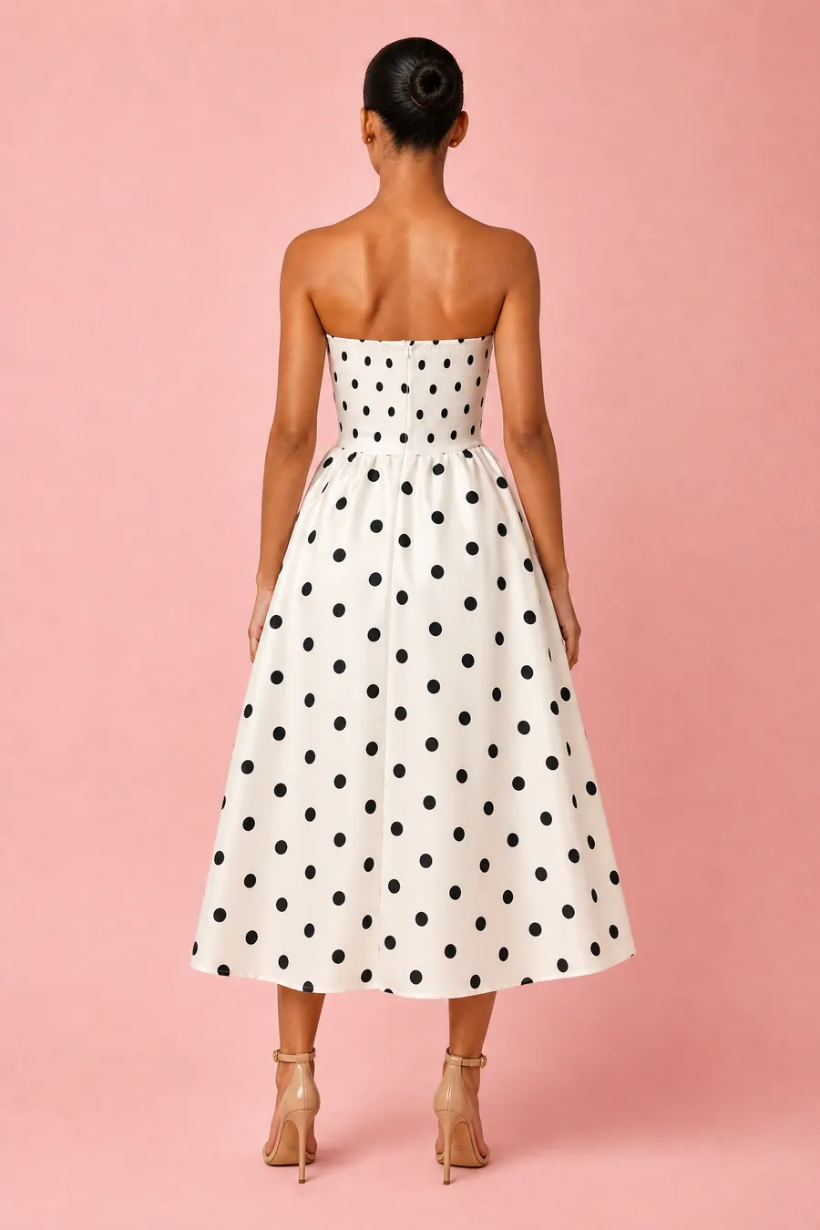 AIVA on-model photo of the polka dot dress, back