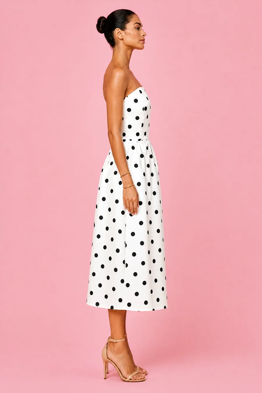 AIVA on-model photo of the polka dot dress, side
